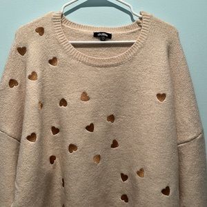 Woman’s Cocobleu cream sweater with gold hearts